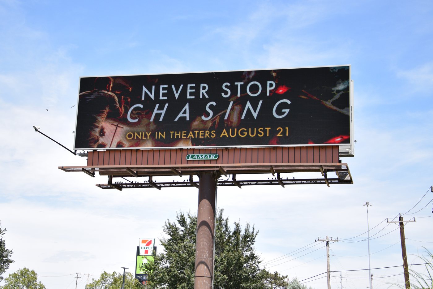 Never Stop Chasing digital bulletin, Panel 9012, campaign photography
