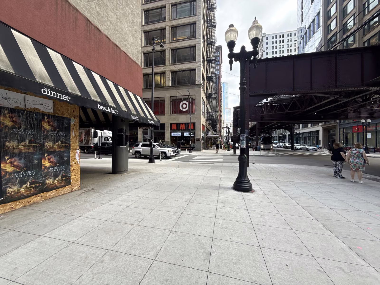 Never Stop Chasing wild posting at 17 E Monroe St, The Loop, Chicago