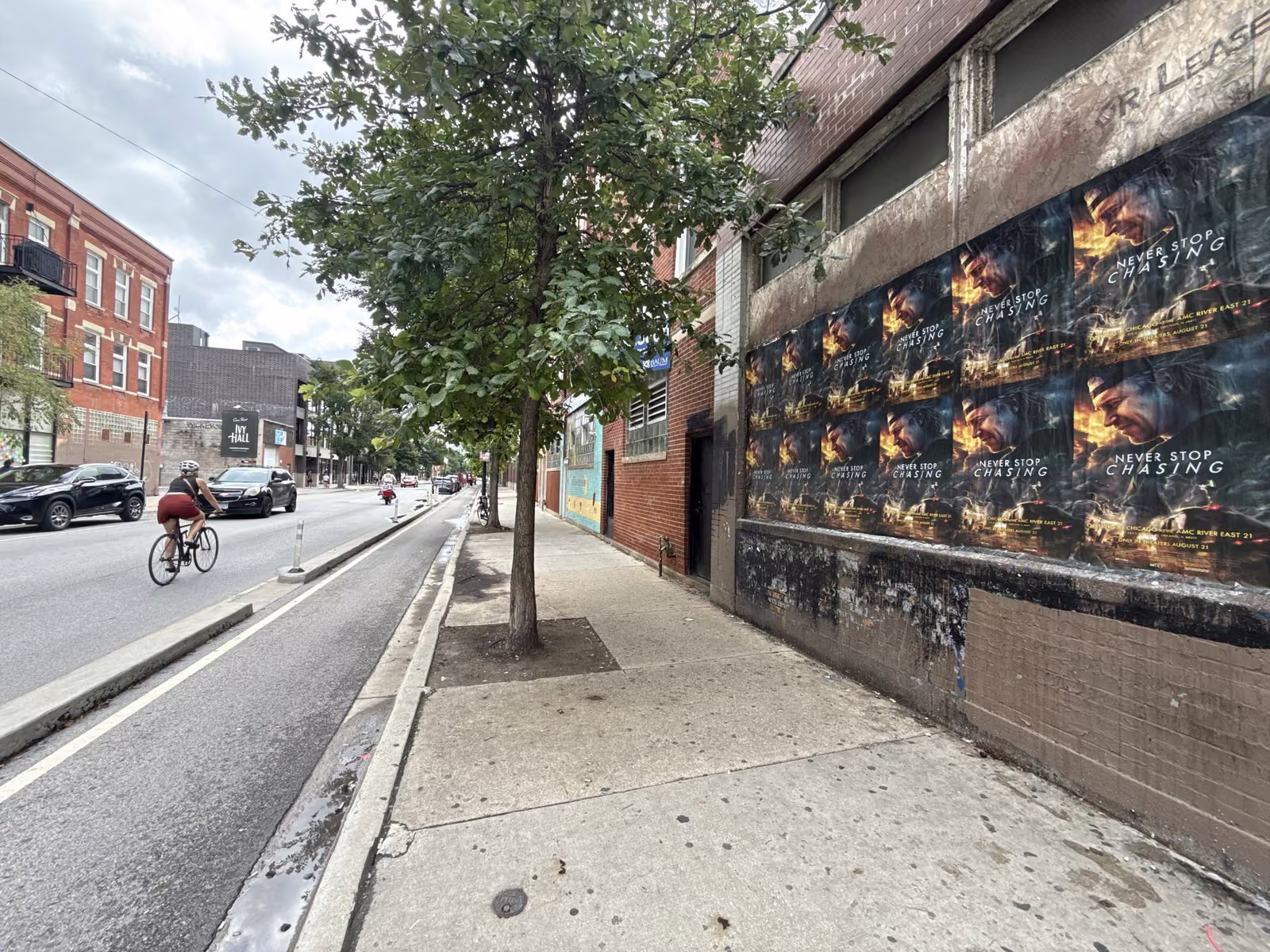 Never Stop Chasing wild posting at 1910 N Milwaukee Ave, Bucktown, Chicago