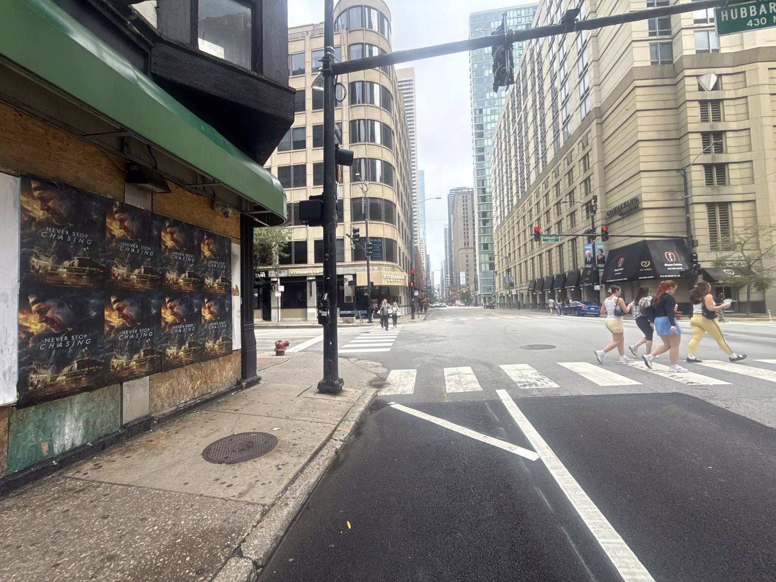 Never Stop Chasing wild posting at 6 E Hubbard St, River North, Chicago