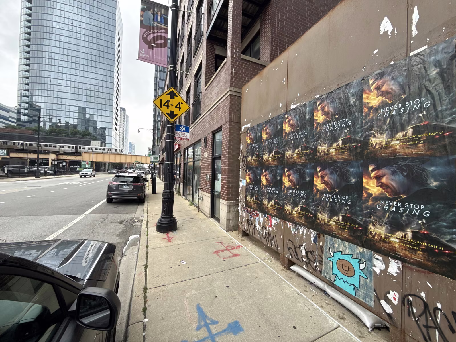 Never Stop Chasing wild posting at 220 N Halsted St, West Loop, Chicago