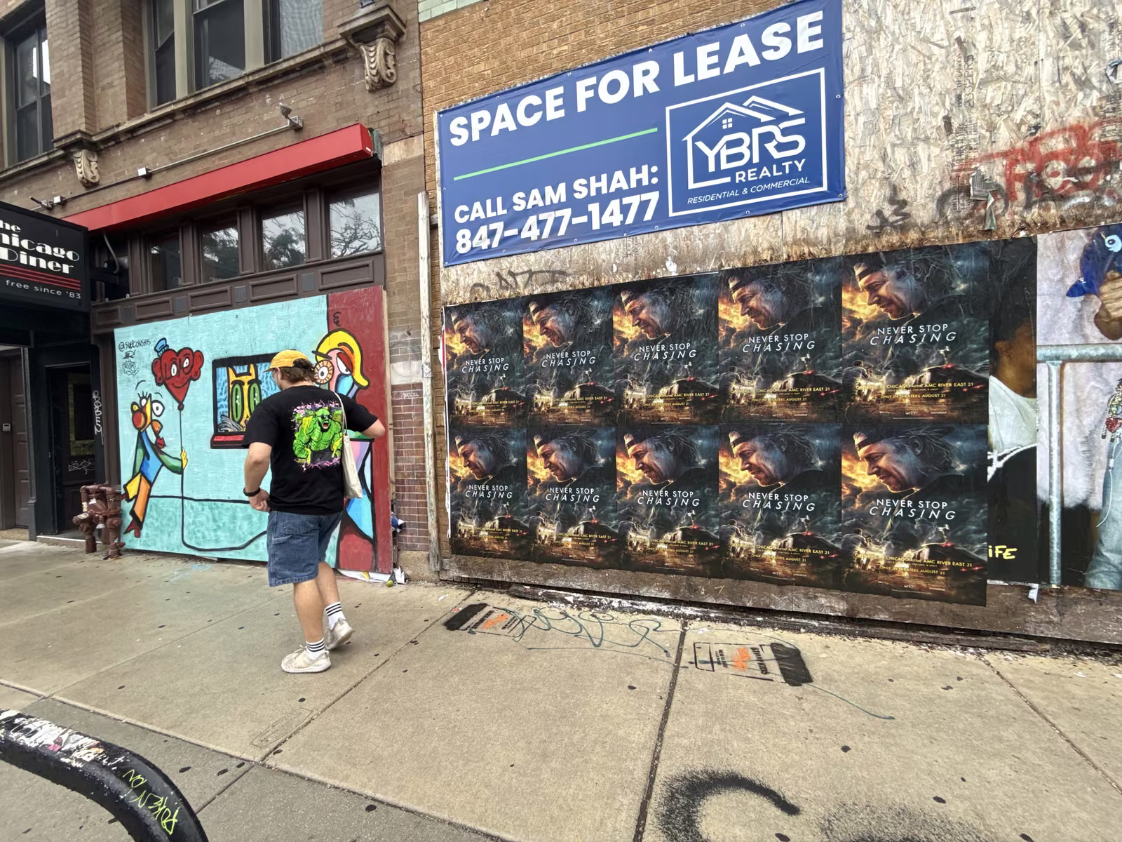 Never Stop Chasing wild posting at 2332 N Milwaukee Ave, Logan Square, Chicago