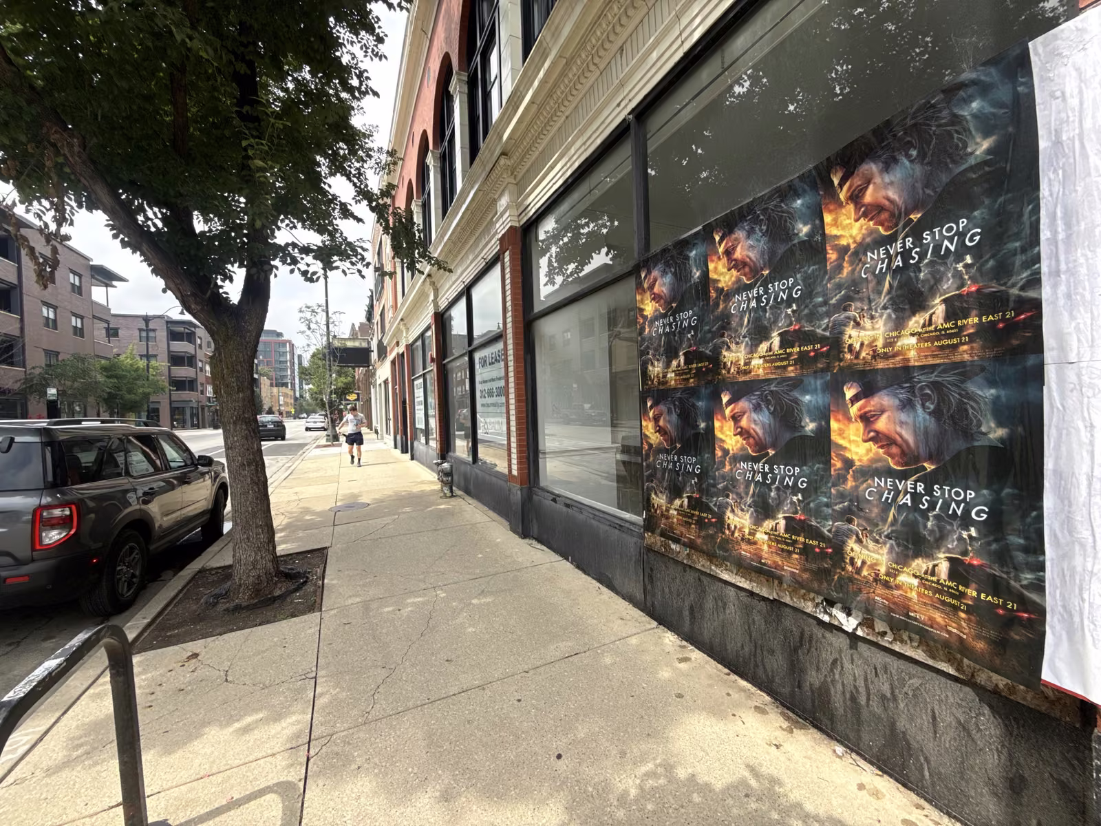 Never Stop Chasing wild posting at 2438 N Lincoln Ave, Lincoln Park, Chicago