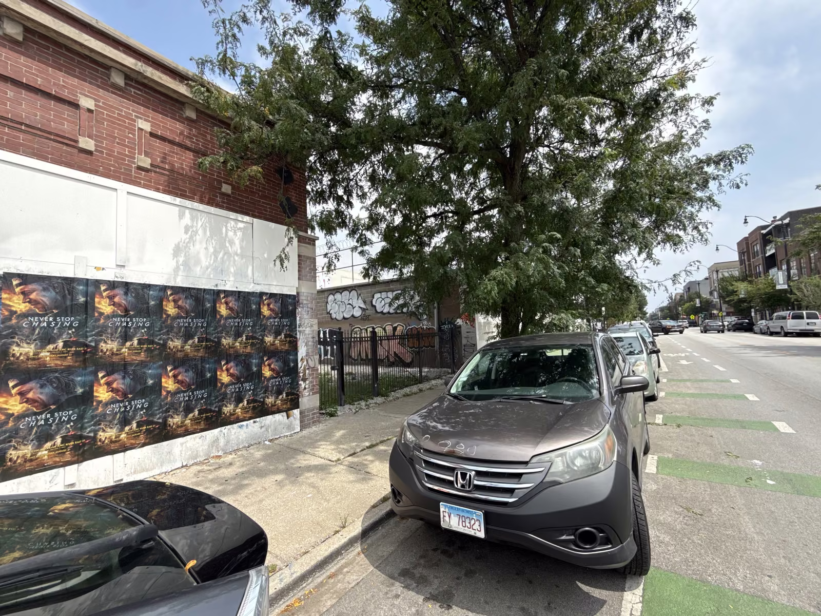 Never Stop Chasing wild posting at 3115 W Armitage Ave, Logan Square, Chicago