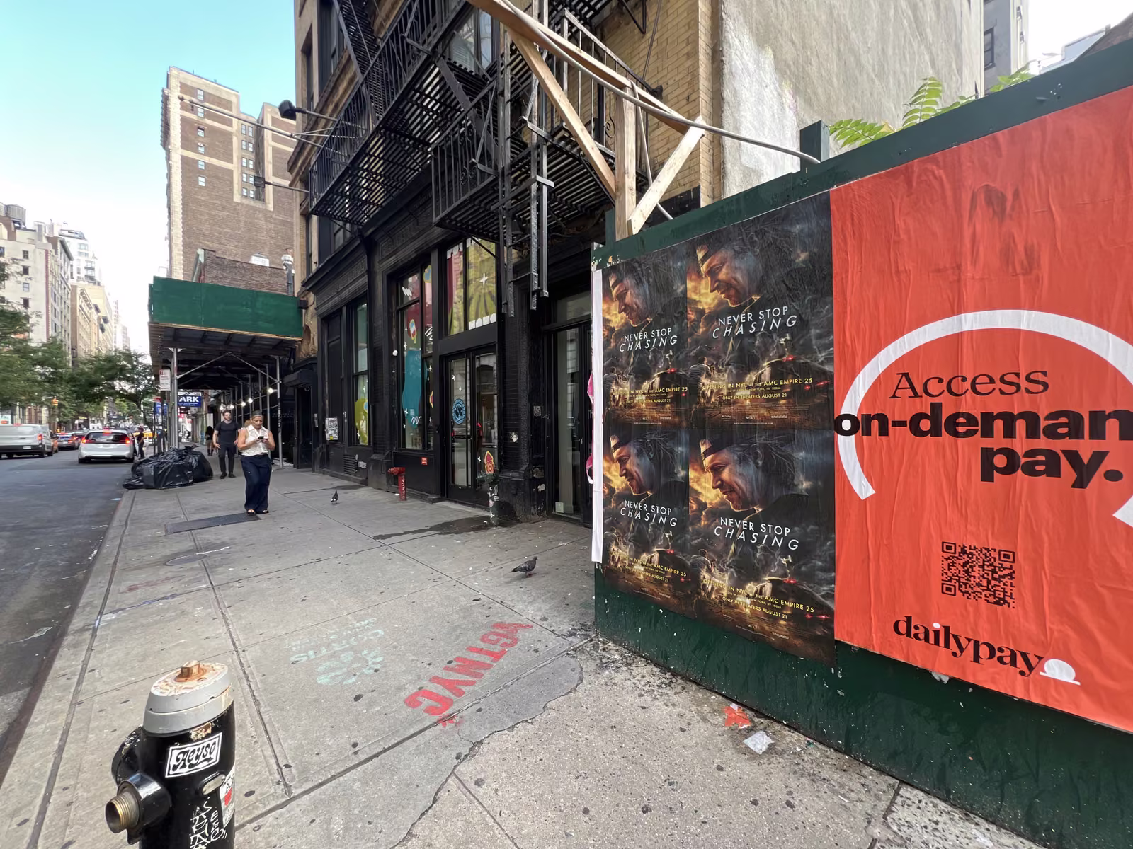 Never Stop Chasing wild posting at 119 W 23rd St, Chelsea, Manhattan