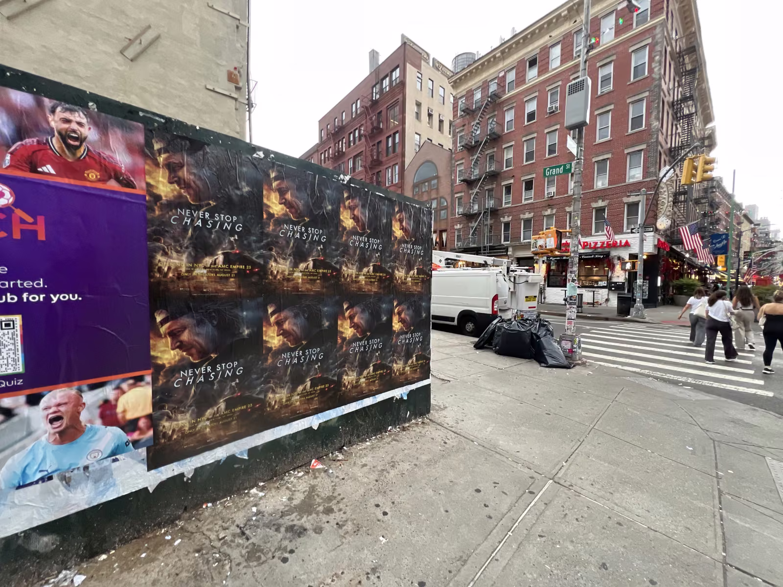 Never Stop Chasing wild posting at 190 Grand St - Location 2, Little Italy, Manhattan