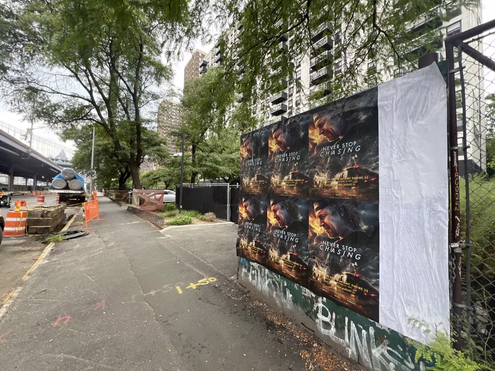 Never Stop Chasing wild posting at 283 South St, Two Bridges, Manhattan