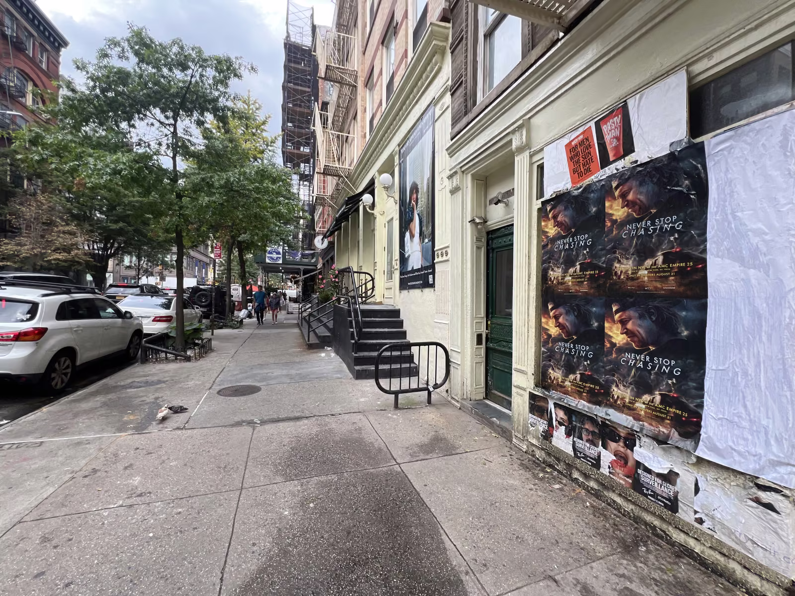 Never Stop Chasing wild posting at 360 W Broadway, SoHo, Manhattan