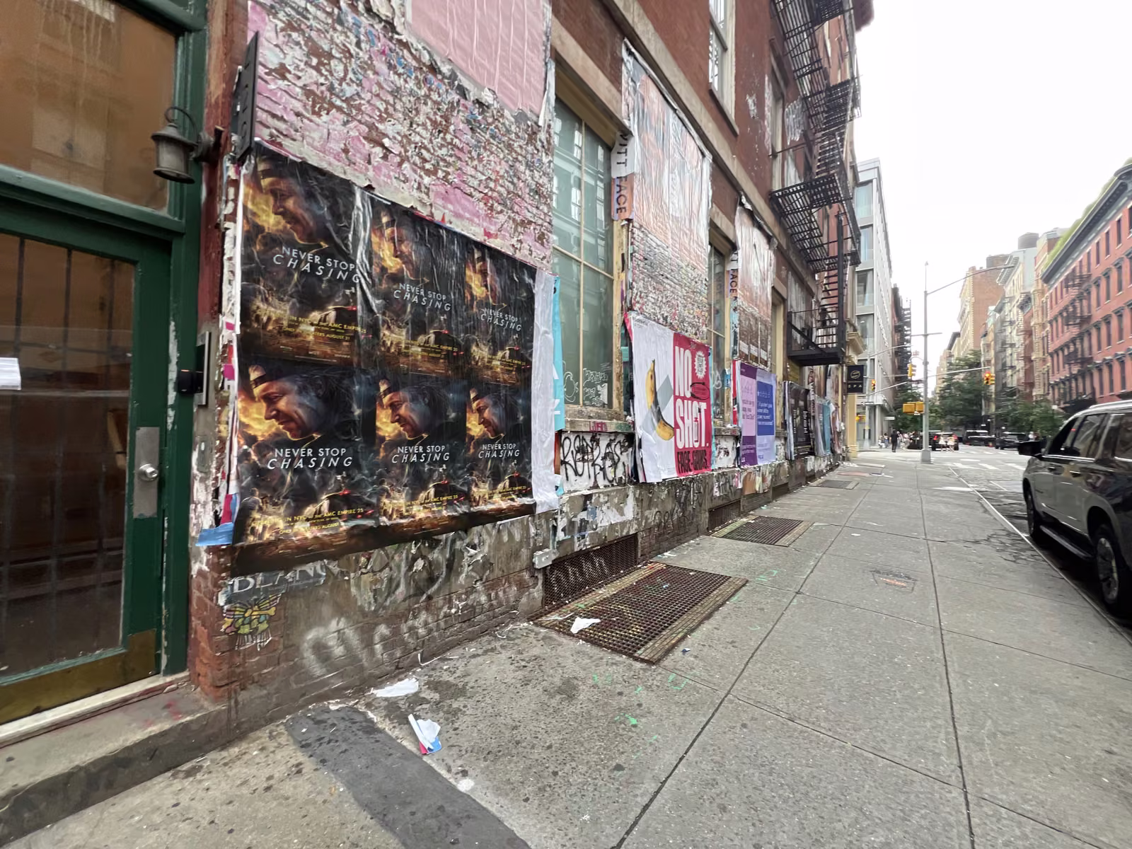 Never Stop Chasing wild posting at 39A Crosby St, SoHo, Manhattan