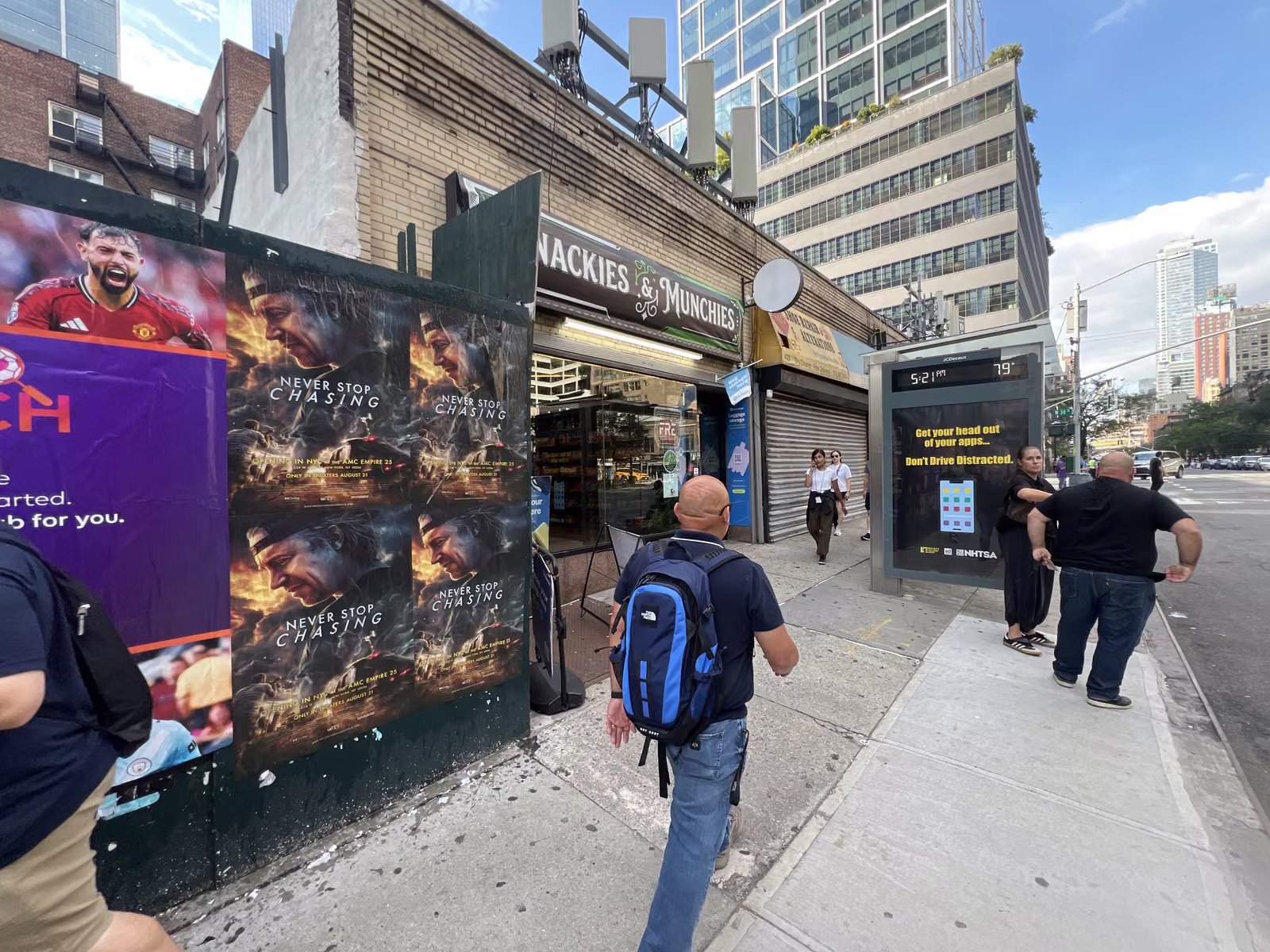 Never Stop Chasing wild posting at 421 9th Ave, Garment District, Manhattan