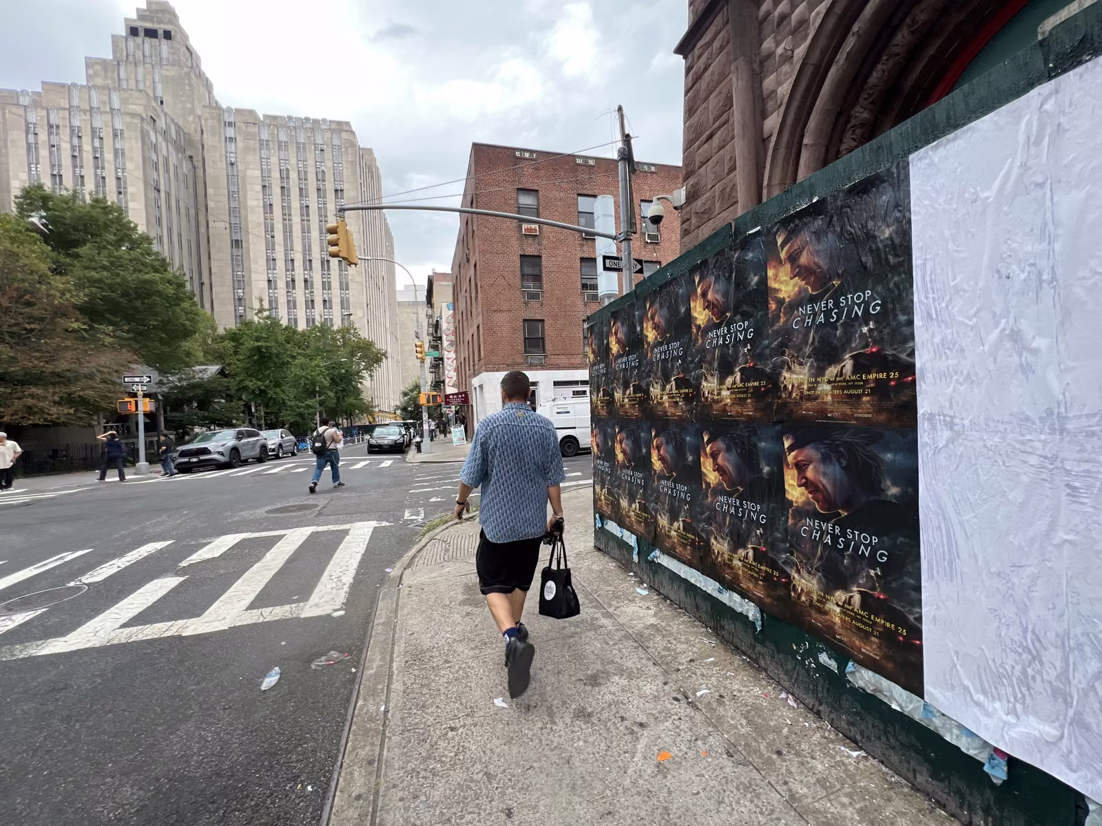 Never Stop Chasing wild posting at 711/2 Mulberry St - Location 1, Chinatown, Manhattan