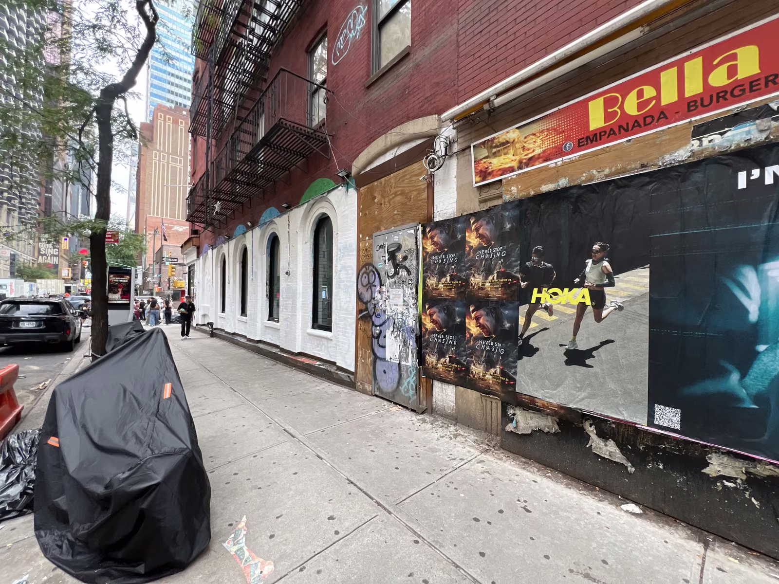 Never Stop Chasing wild posting at 797 8th Ave, Hell's Kitchen, Manhattan
