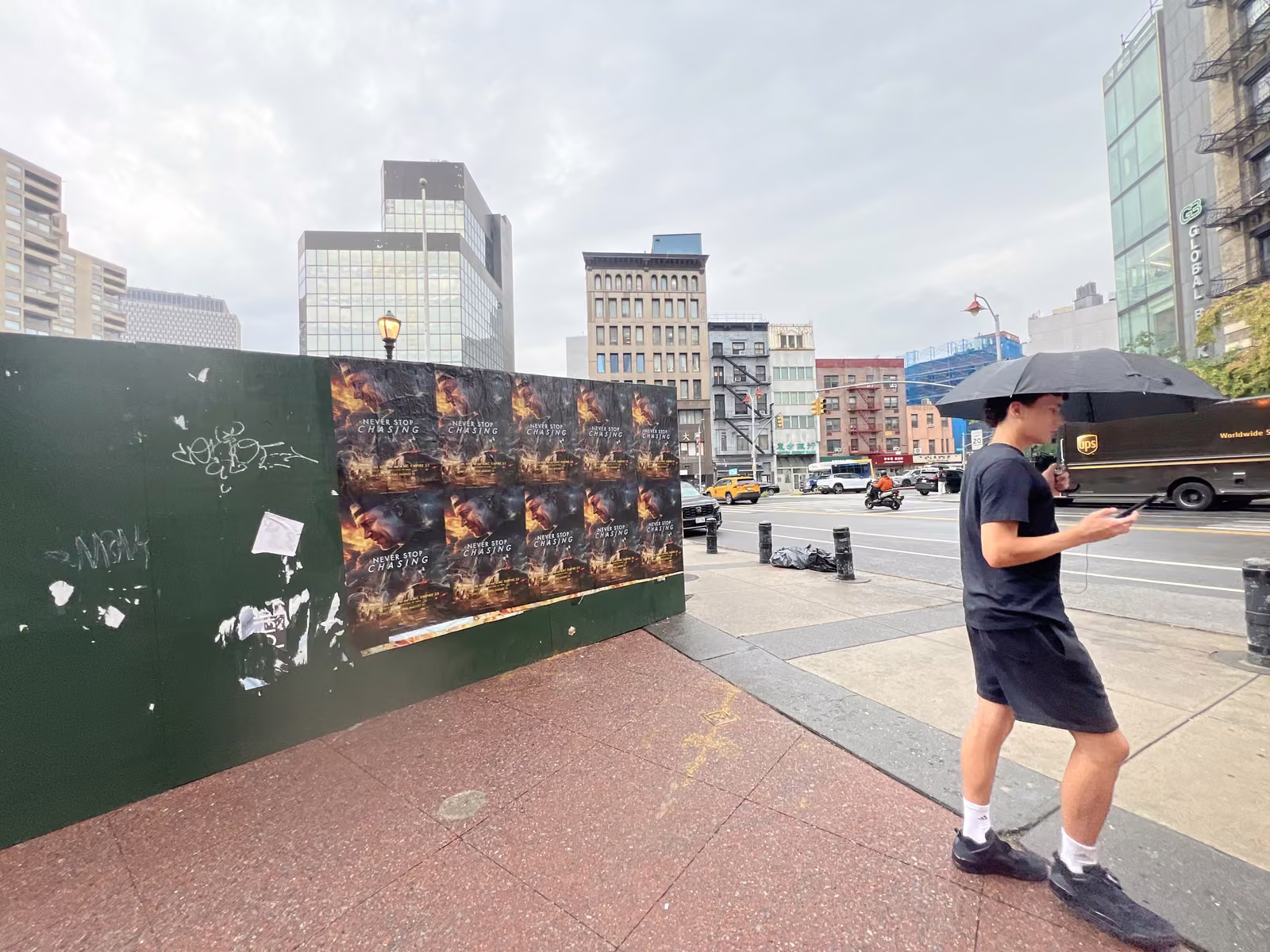 Never Stop Chasing wild posting at Kimlau Square / Park Row, Chinatown, Manhattan