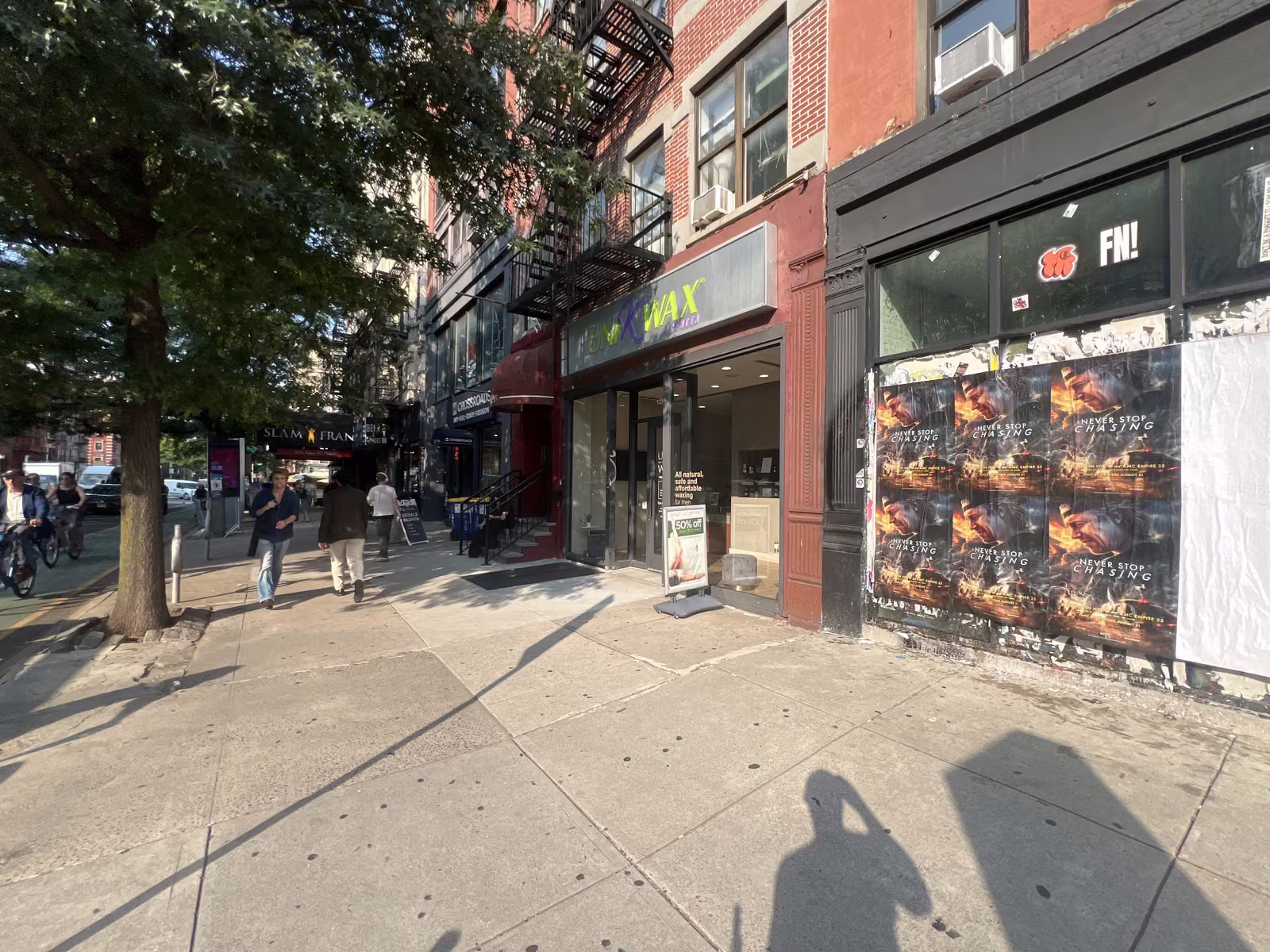 Never Stop Chasing wild posting at 117 2nd Ave, East Village, Manhattan