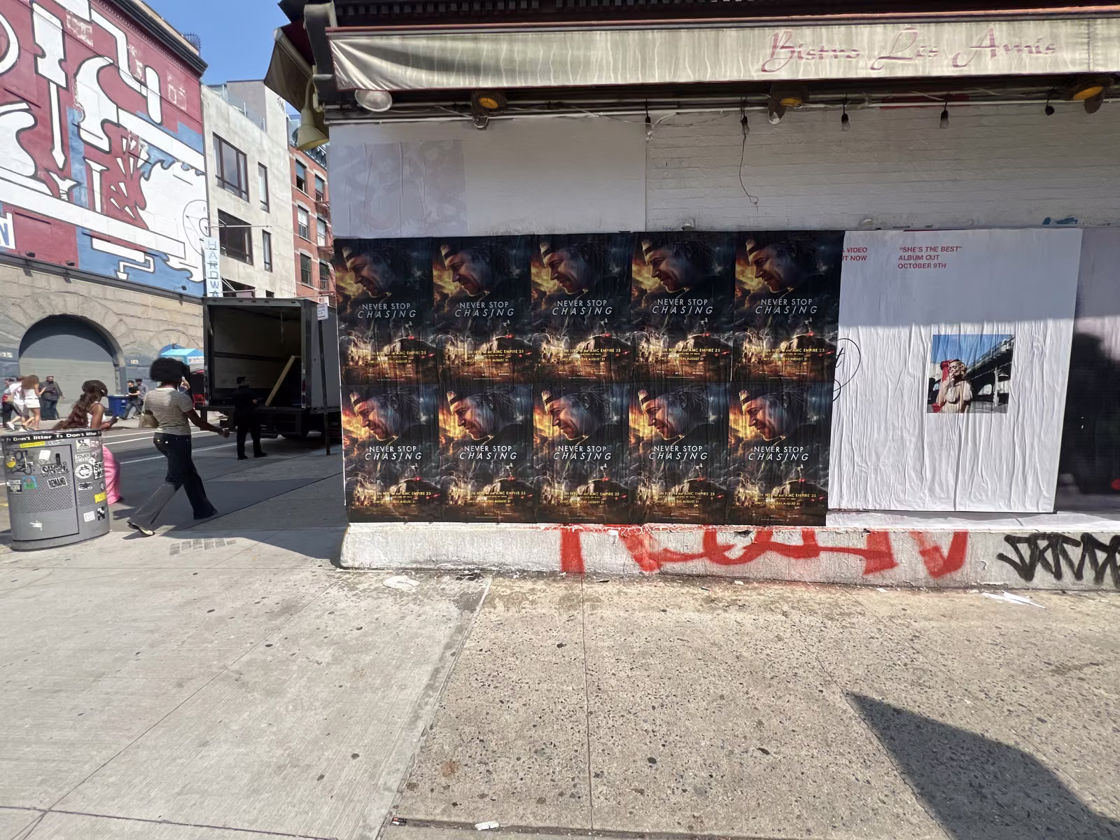 Never Stop Chasing wild posting at 180 Spring St, SoHo, Manhattan