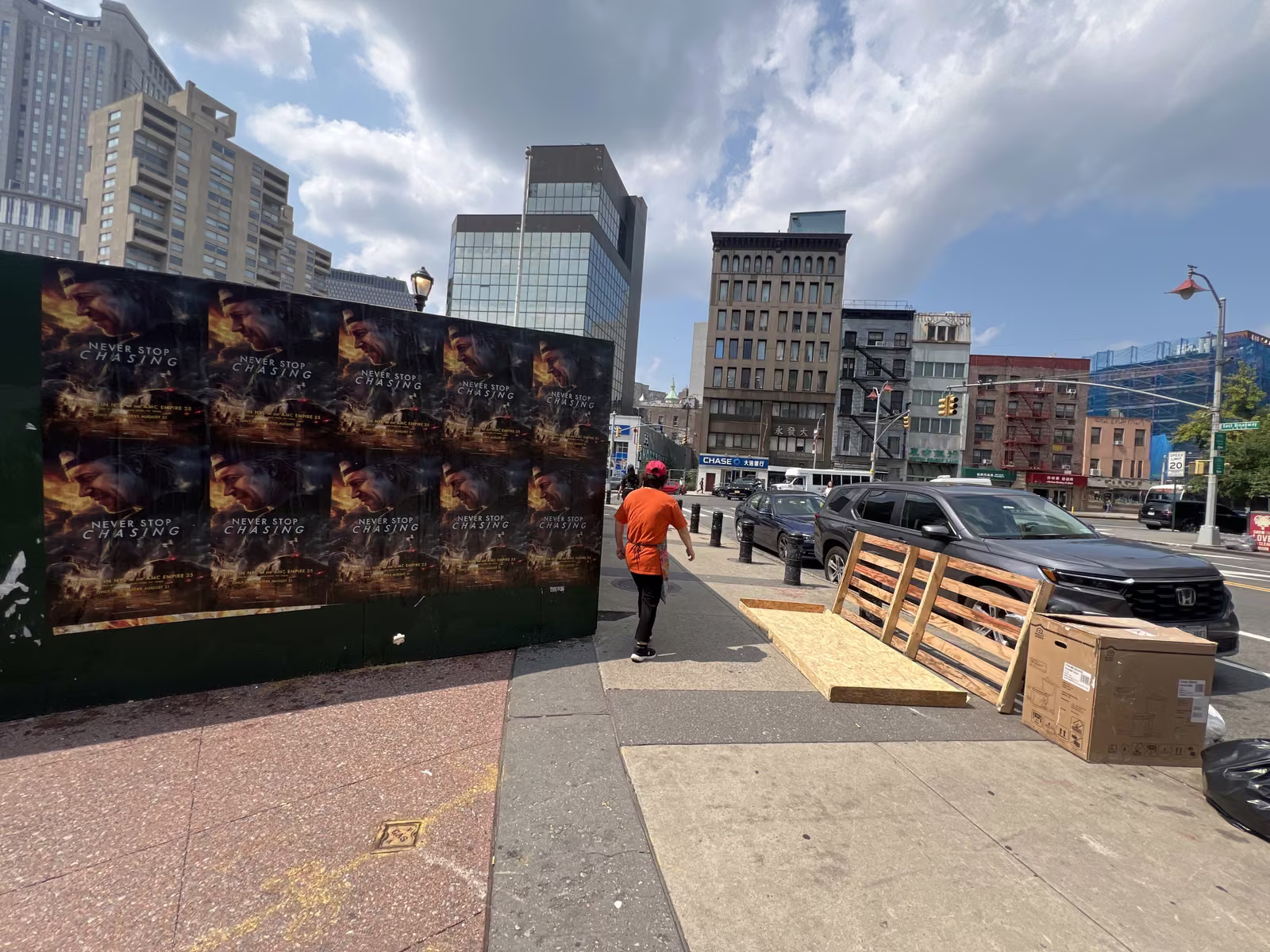 Never Stop Chasing wild posting at 22 Chatham Square, Chinatown, Manhattan