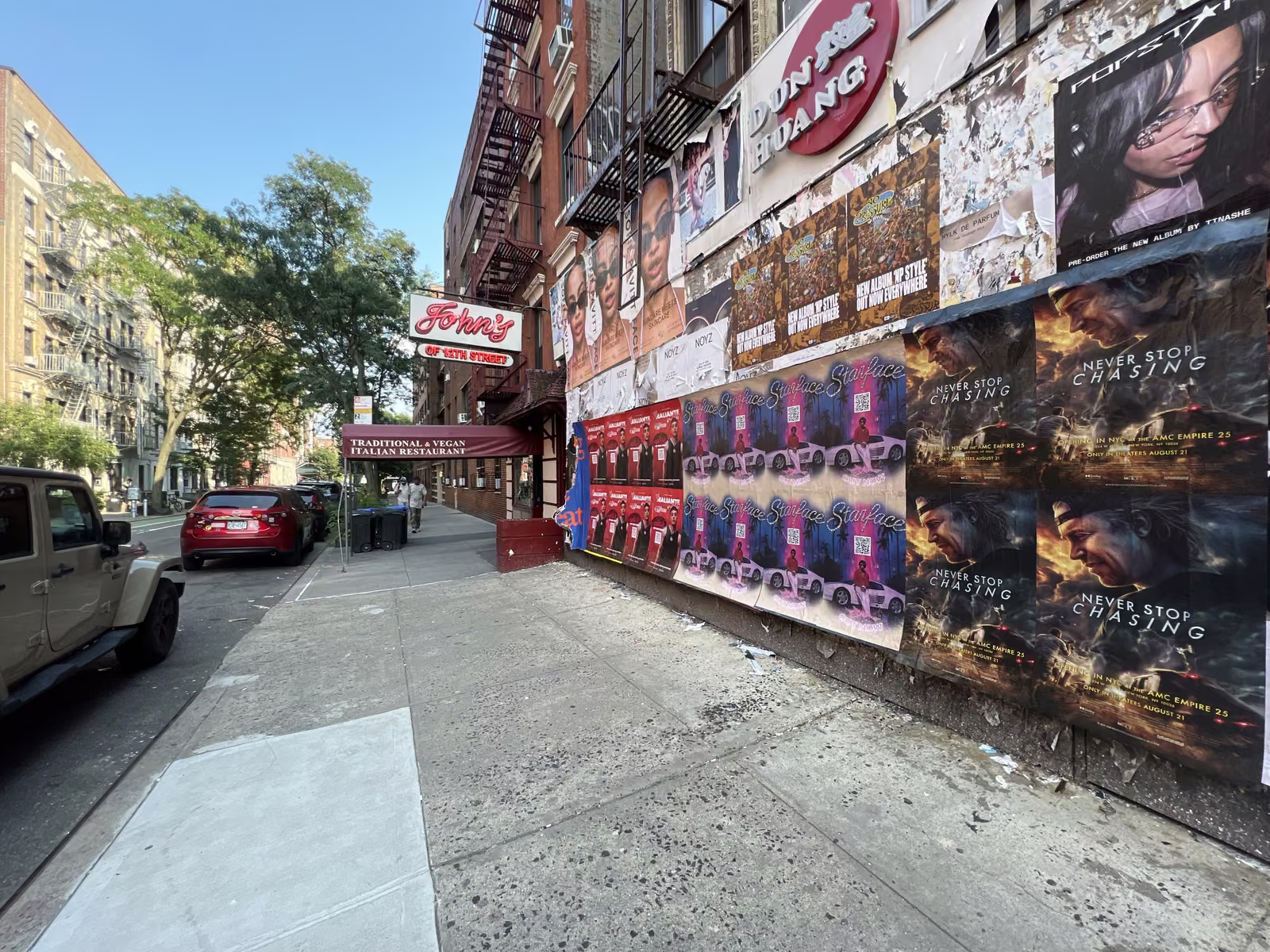 Never Stop Chasing wild posting at 302 E 12th St, East Village, Manhattan
