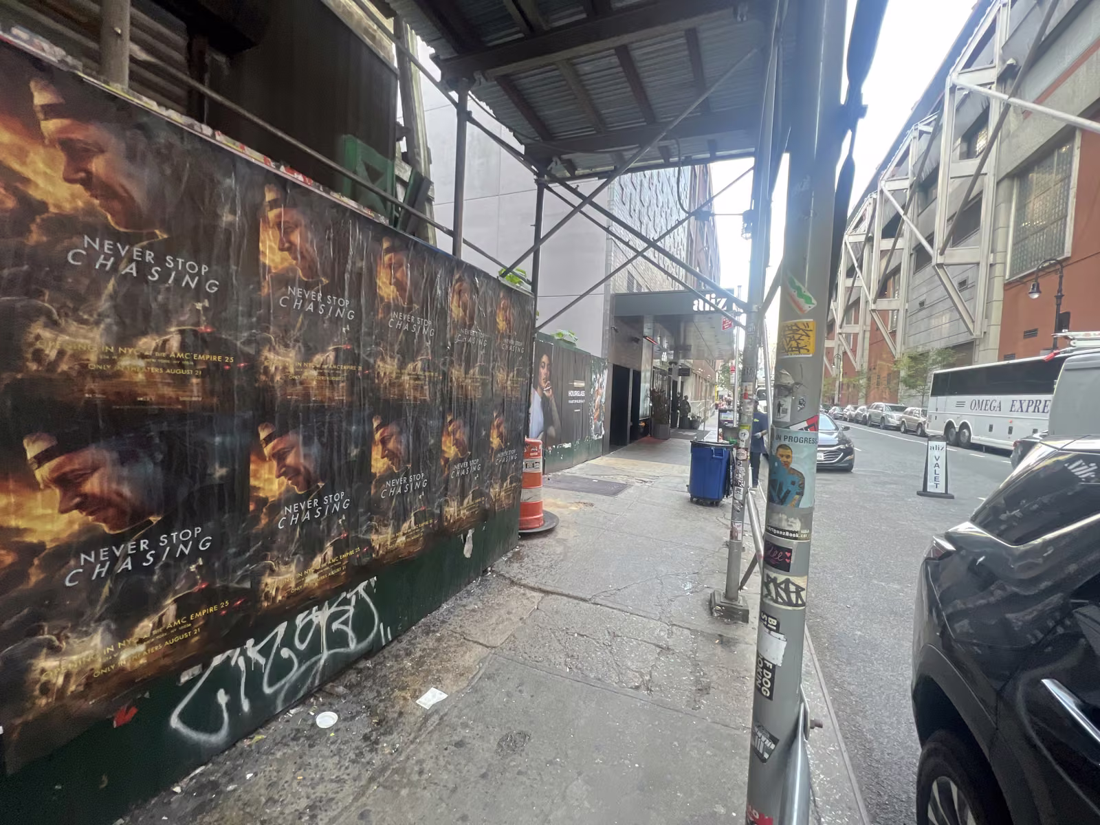 Never Stop Chasing wild posting at 625 8th Ave, Times Square, Manhattan